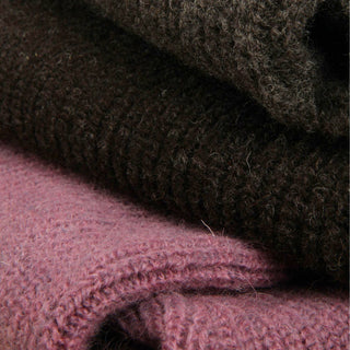 Close-up of dark brown and pink textured fabric