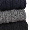 stack of scarves on a white background