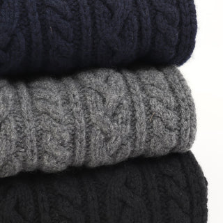 stack of scarves on a white background