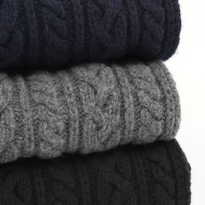 stack of scarves on a white background