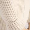 Close-up of white rib knitted sleeve