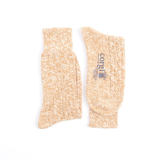 showing a pair of socks knitted in a yellow and white mix colour