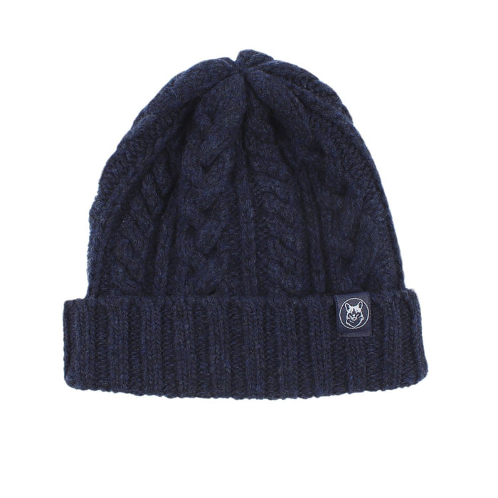A navy men's wool beanie with a cable knit pattern and a ribbed turn-up hem.