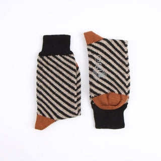 Pair of striped gloves with brown accents on a white background