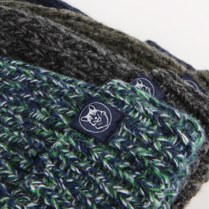 Close-up of a green and gray knitted product with a brand logo on a white background
