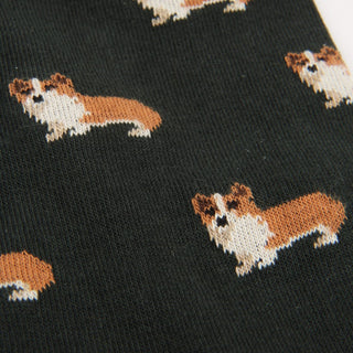 Green socks with brown and white corgi dog pattern