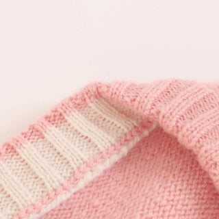 Close-up of pink and white knitted fabric