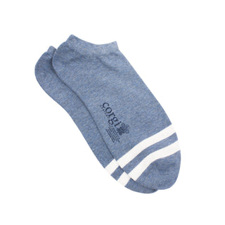 A pair of denim blue trainer socks with white stripes on the toe.