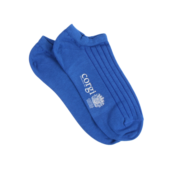 Pair of blue socks with 'corgi' branding on a white background