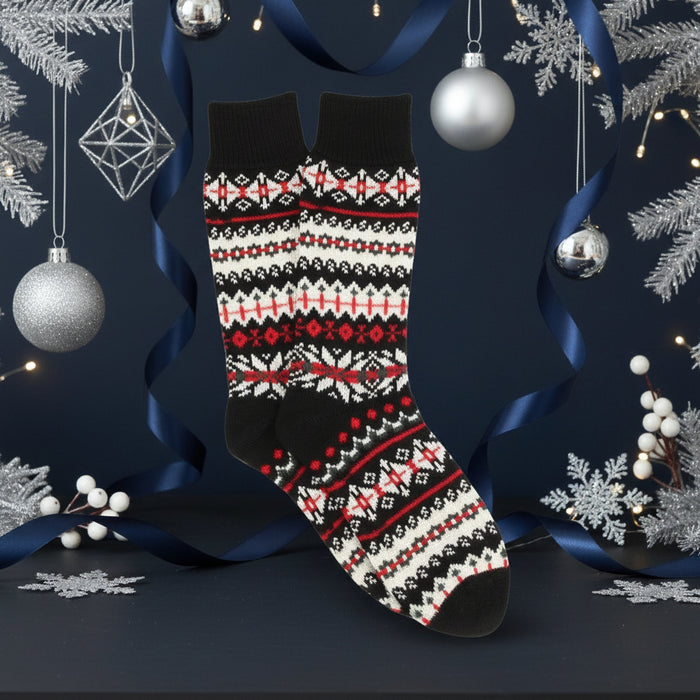 Black sock with a colorful pattern on a white background