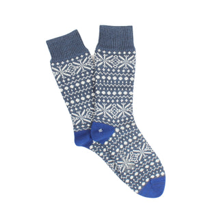 Blue and white patterned sock on a white background