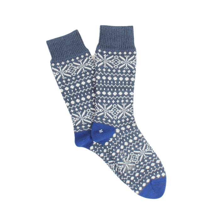 Blue and white patterned sock on a white background