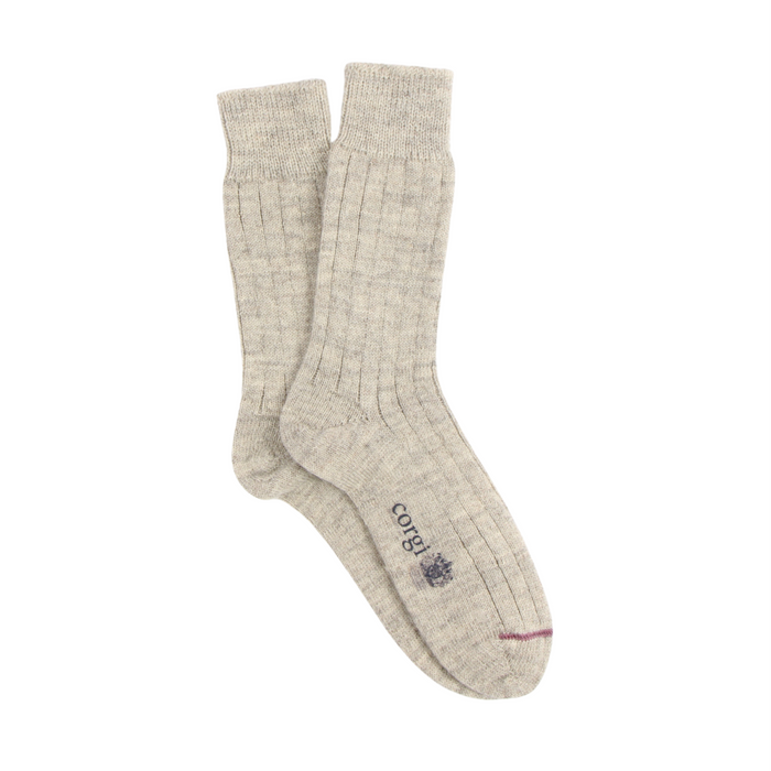 Pair of silver socks with a brand logo on a white background