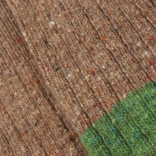 Close up of the Donegal wool flecked yarn.