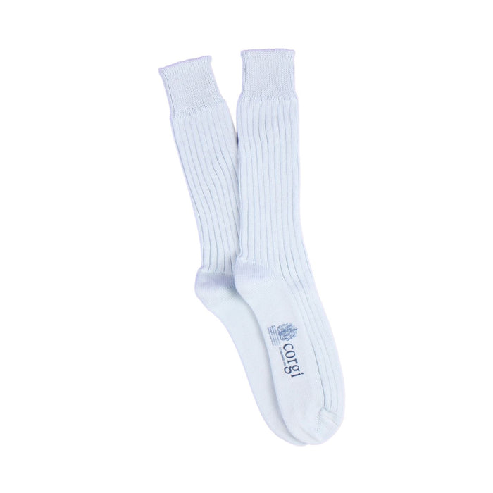 Pale blue crew length socks with a brand logo on a white background