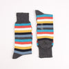 Pair of striped socks with gray cuffs photographed on a white background