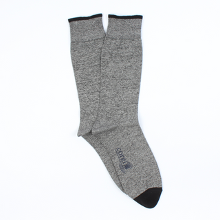 A pair of men's marl cotton socks in a mid-calf length with a ribbed cuff, featuring a subtle pattern and the brand 'Corgi' visible on the foot area.