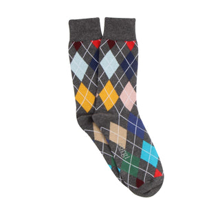 Colorful argyle patterned sock on a white background