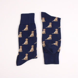 Navy blue socks with Labrador dog pattern photographed on a white background
