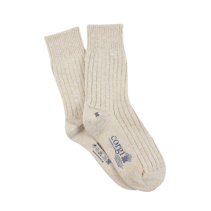 Pair of beige socks with a brand logo on a white background