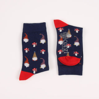 Pair of socks with gnome and mushroom pattern on a white background