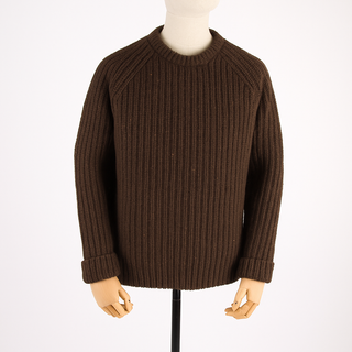 Brown ribbed sweater on a mannequin against a white background