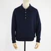 Navy blue sweater on a mannequin against a white background