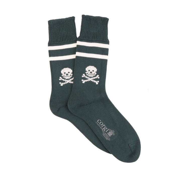 Dark green socks with skull and crossbones design on a white background