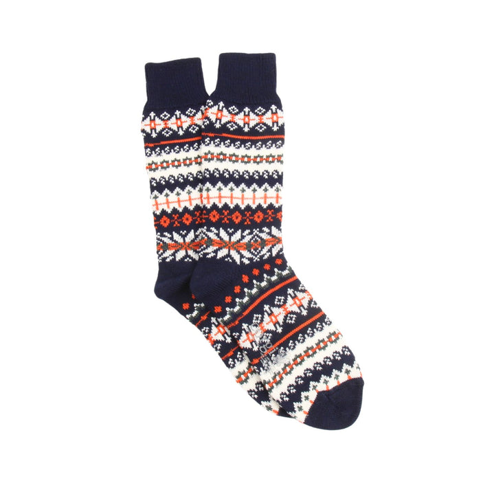 fairisle sock knitted in a navy main with white and orange fairisle patterning