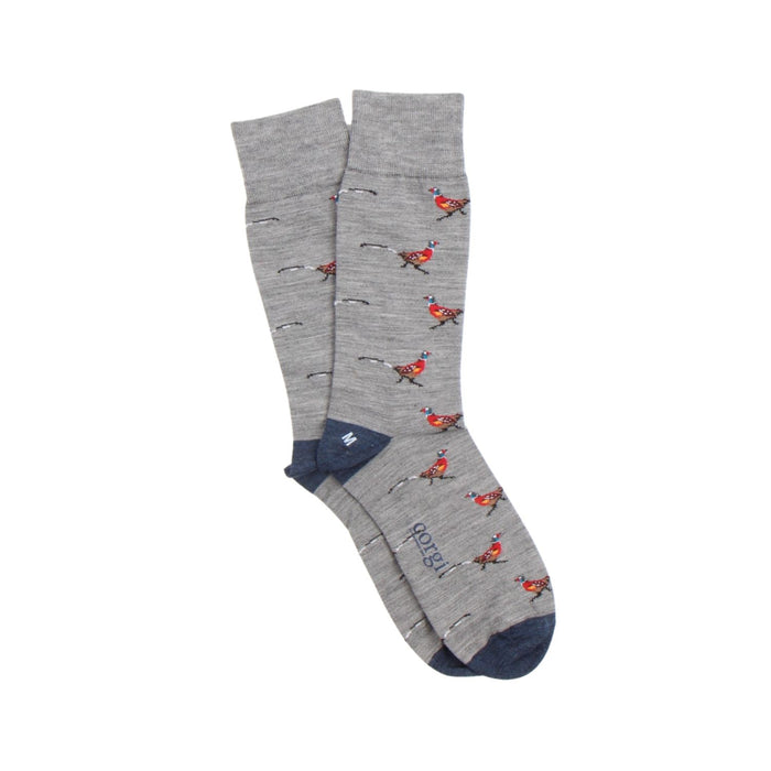 Grey socks with bird pattern on a white background