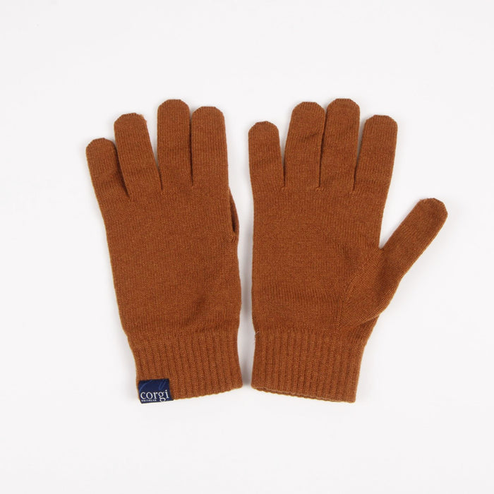 Pair of brown gloves with a brand label on a white background