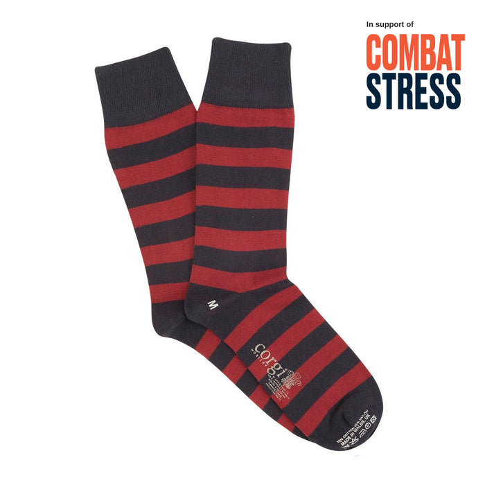 Navy and red striped socks with 'Combat Stress' text on a white background