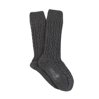 A pair of grey cashmere socks with a cable knit pattern, displayed against a white background.
