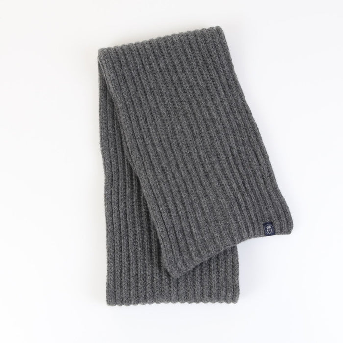 Grey knitted scarf on a white background