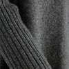 Close-up of a gray textured fabric with ribbed pattern