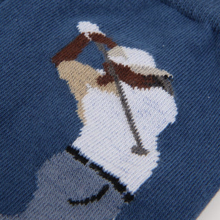 picture of a golfer taking a swing  on a blue background