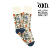 A pair of women's mid-calf socks featuring a William Morris-inspired trellis pattern with floral elements in blue and white colors.