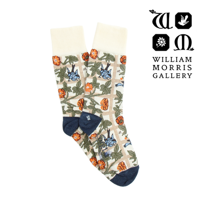Pair of socks with floral and bird pattern on a white background, featuring the William Morris Gallery logo.