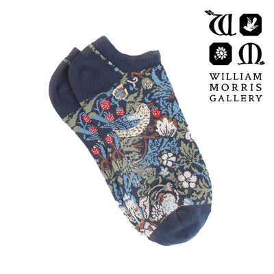 Decorative sock with floral and bird pattern on a white background, featuring the William Morris Gallery logo.