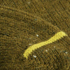 Close-up of green fabric with a lime stripe