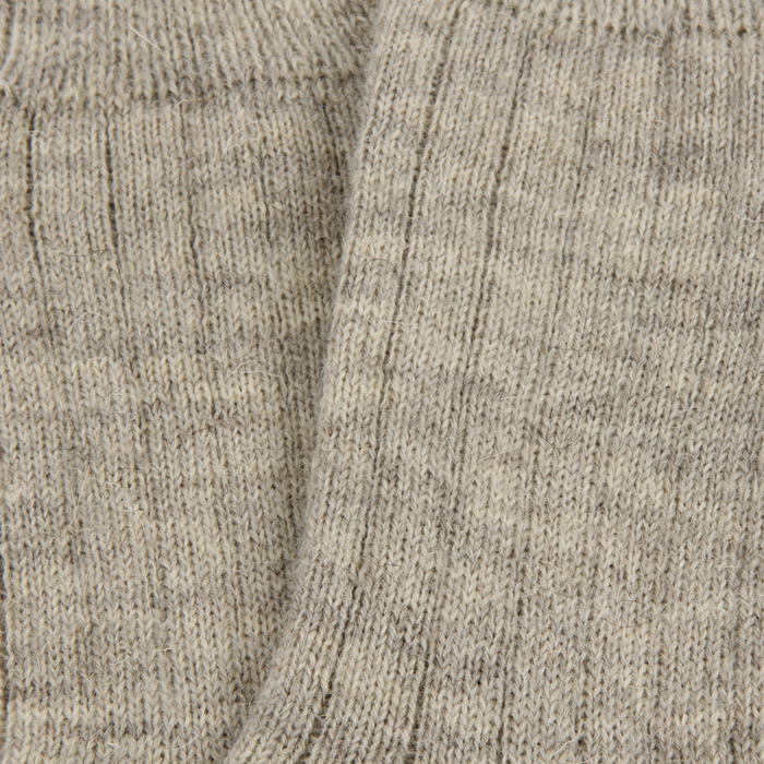 Close-up of silver knitted fabric texture