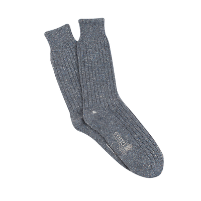 Pair of denim socks on a white background
