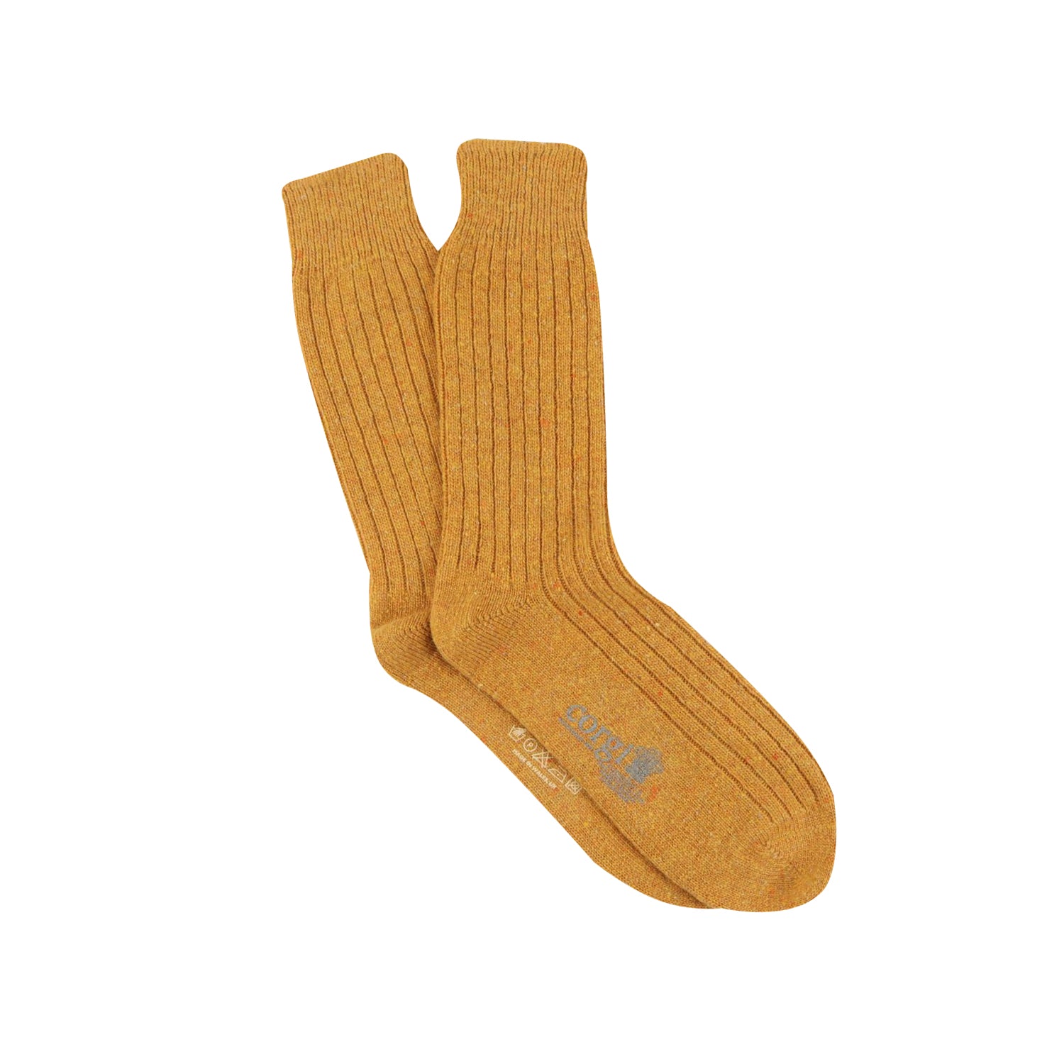 Pair of mustard yellow socks on a white background
