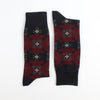 Pair of socks with geometric pattern on a white background