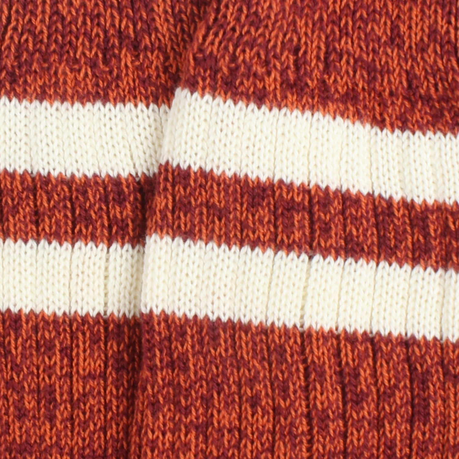Close-up of red and white striped fabric texture
