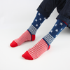 person wearing USA flag socks with stars and stripes pattern