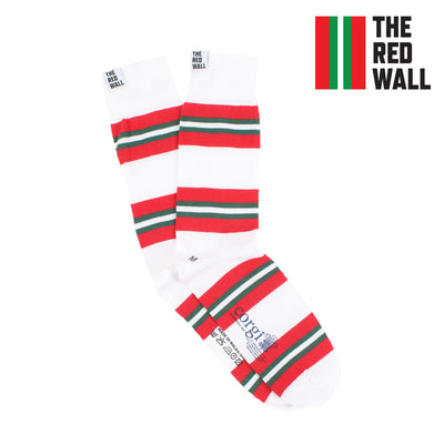 A pair of white cotton socks with red and green horizontal stripes, branded with 'THE RED WALL' logo.