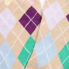 Close-up of argyle patterned socks with pastel colors on a beige background