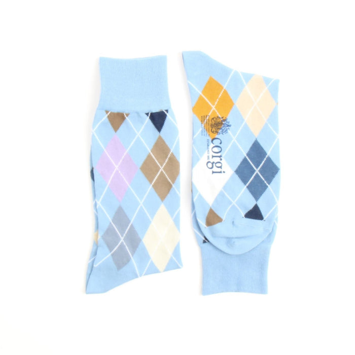 Pair of socks with argyle pattern on a light blue background