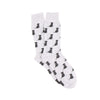 light grey socks with an all over intarsia black Labrador retriever pattern photographed on a white background